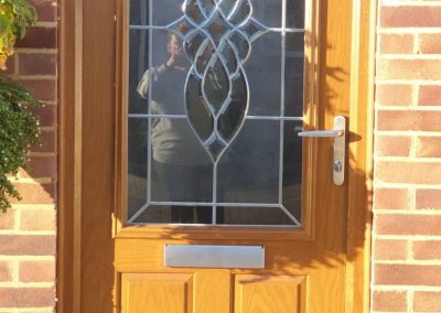 Oak composite door with bevel glass