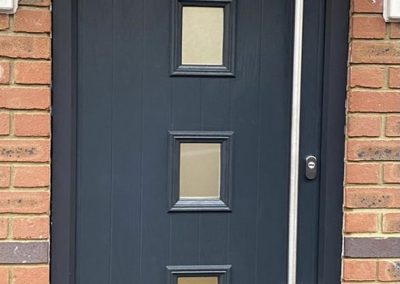 anthracite grey composite door and frame with bar handle