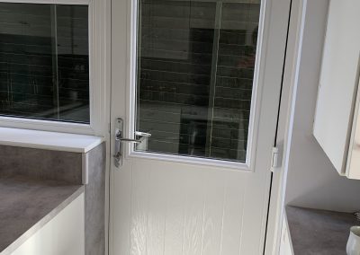 white composite back door inside