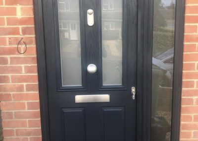 black composite door and side panel pull knob